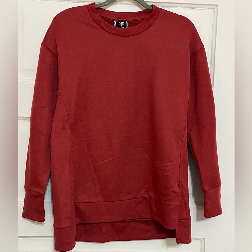 Burgundy New Balance pullover. Size small. Excellent used condition
